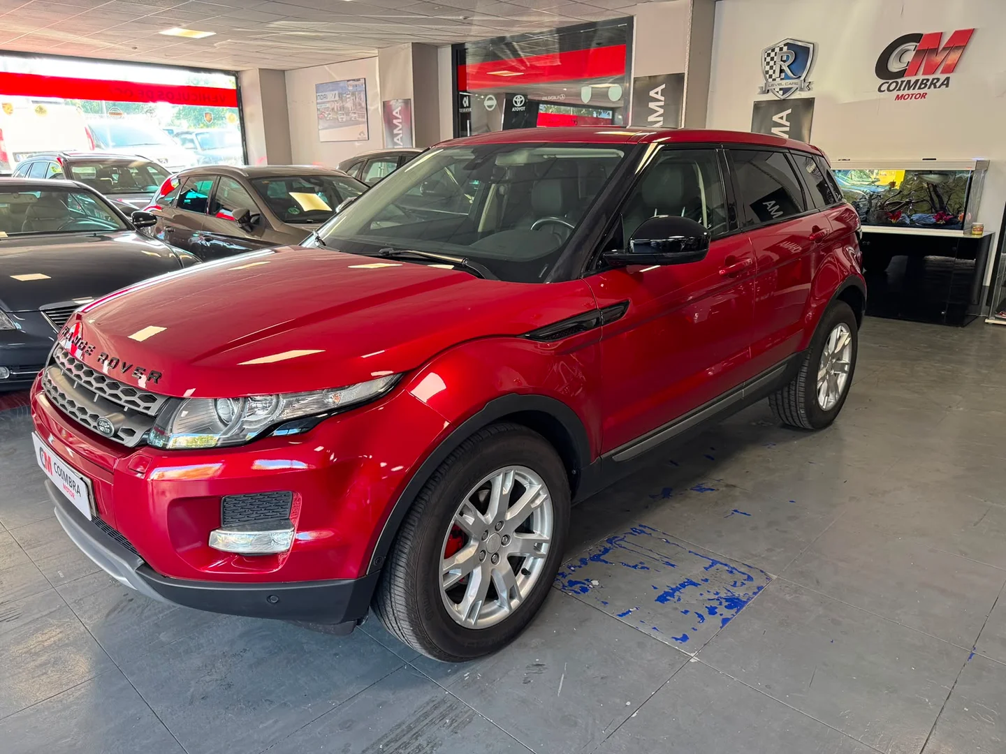 Land Rover Range Rover Evoque 2.2L TD4 150CV 4x4 Pure Tech Auto. 2013 Diésel Rojo - Vista principal