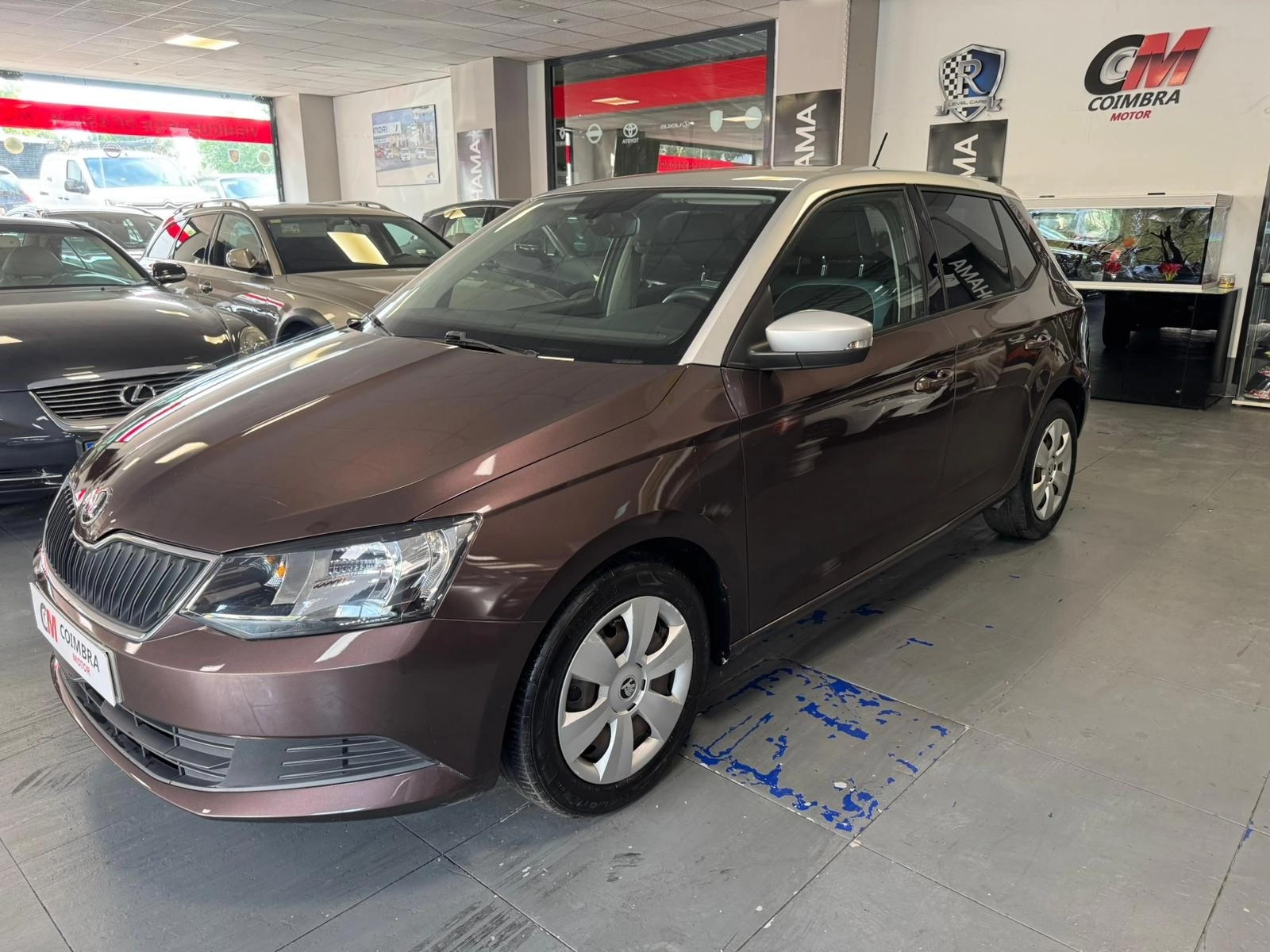 SKODA Fabia 1.4 TDi 90cv Ambition 2015 Diésel Marrón - Vista principal